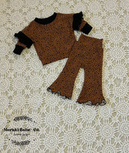 Load image into Gallery viewer, Dolman with Eyelet Ruffles and Flare Leg Pants Animal Print Set 3-6 Mo 626
